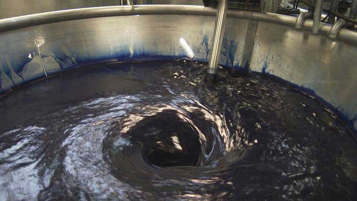 Water polluted by paint